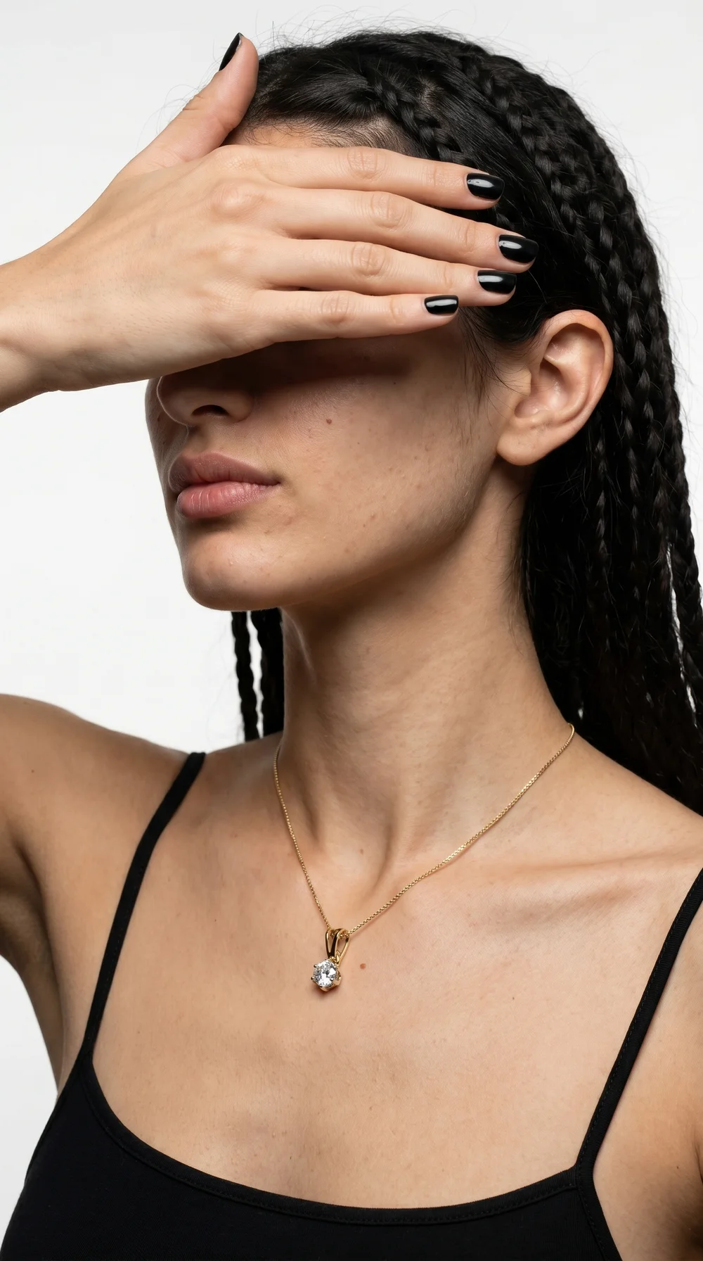Editorial model wearing jewellery for inspiration, not this jeweller's inventory or endorsement