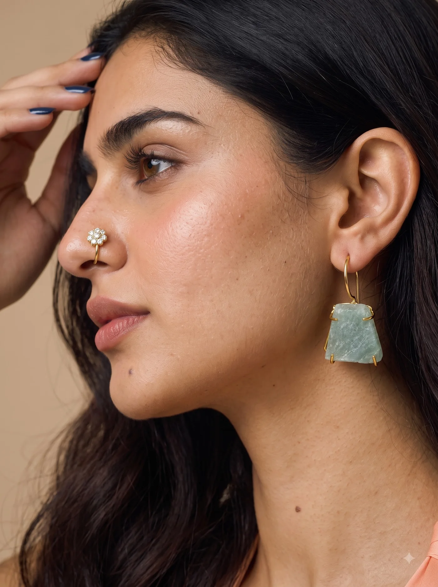 Editorial model wearing jewellery for inspiration, not this jeweller's inventory or endorsement